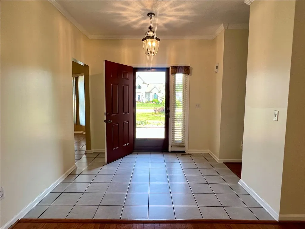Come inside-Beautiful ceramic tile floor open to spacious living room