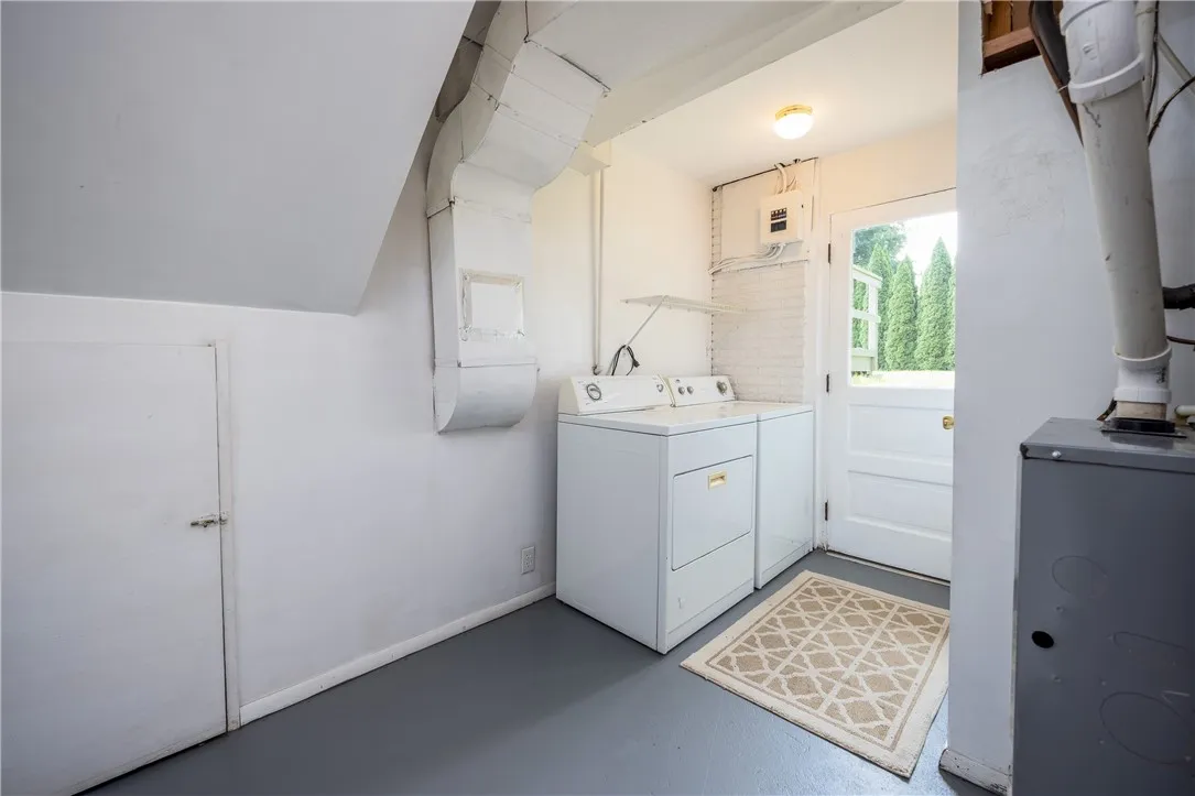 Laundry area - crawl space - door to storage