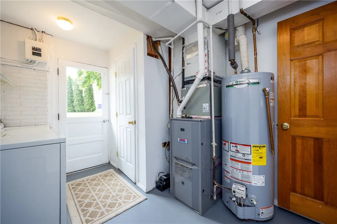 Walk out to rear yard - mechanics and powder room