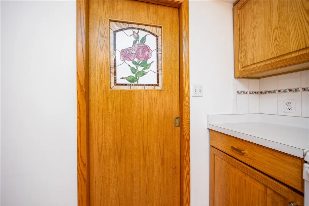 Nice stain glass door to mud room/garage entry