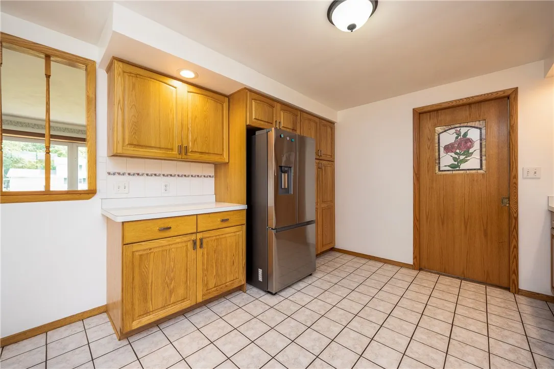 Newer ref and pantry area with slide out drawers!