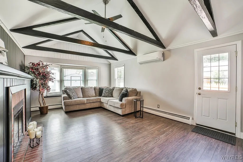 Large, great room! This door leads out to the back patio. Extra large bay window allows light to flood the room!
