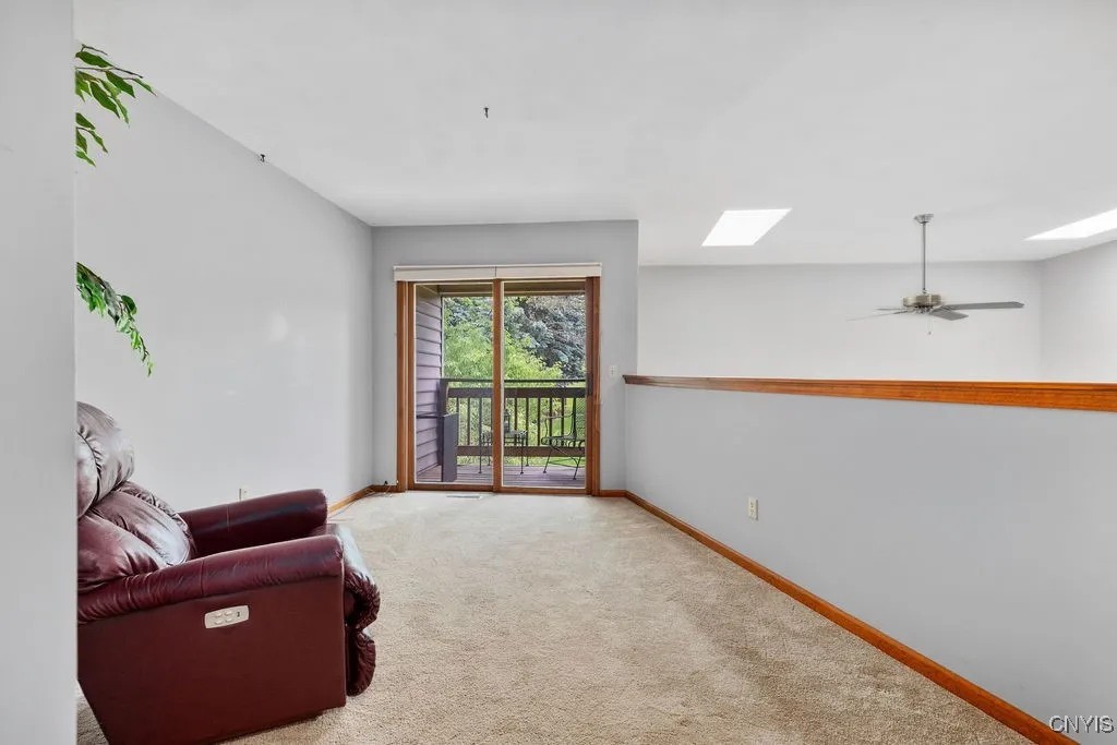 The loft area has access to cute covered porch!