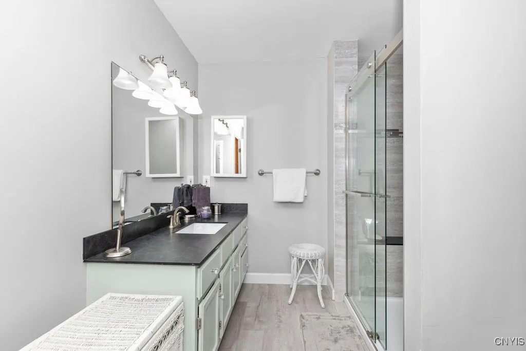 Updated full bathroom with quick access to primary bedroom!