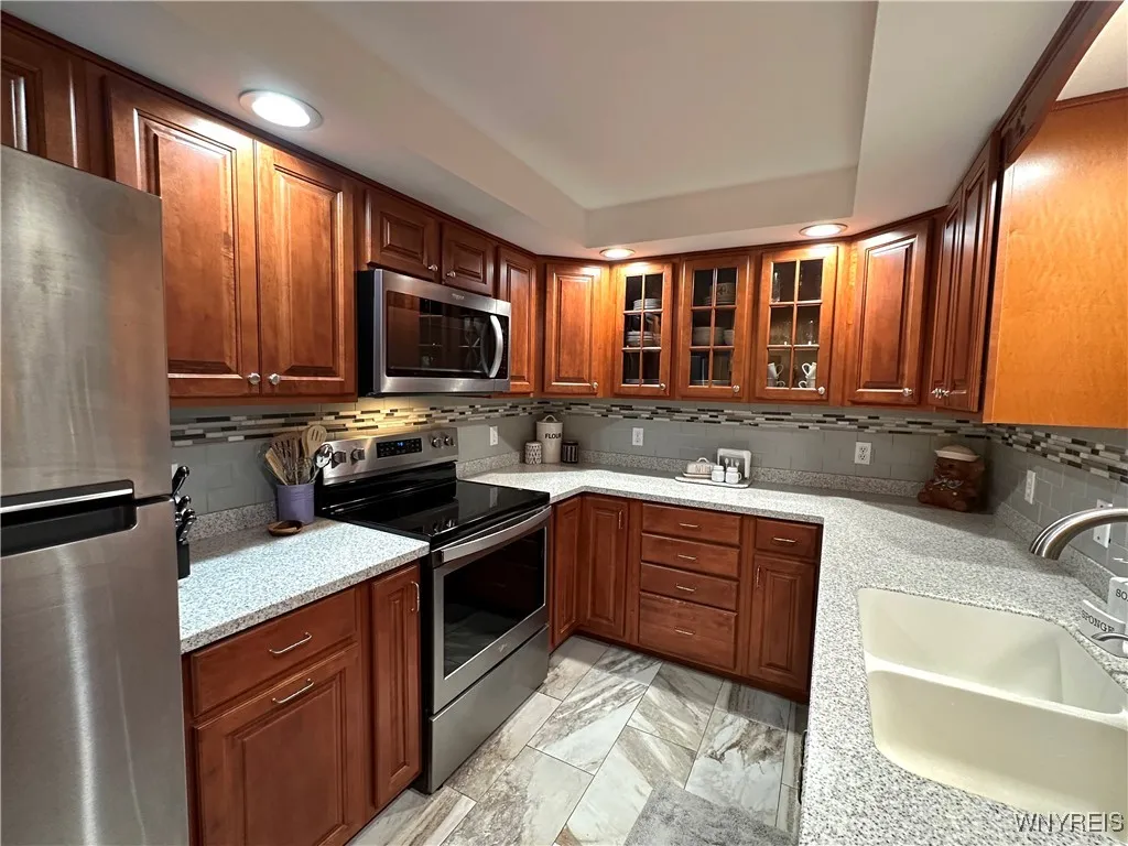 Granite kitchen includes SS appliances