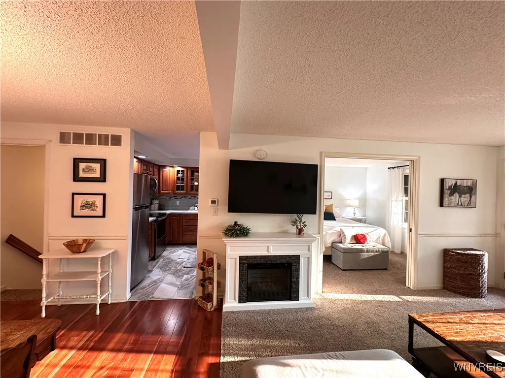 Dining room/living room/ kitchen and door to finished lower level
