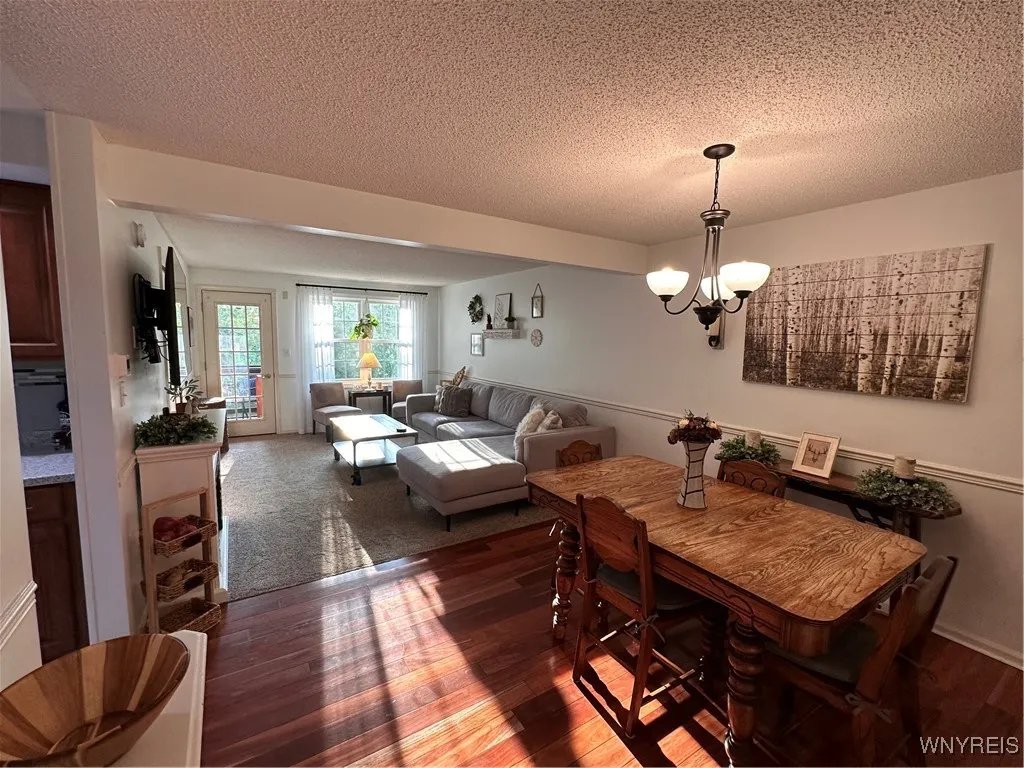 Dining area open to the living room -lots of natural sunlight