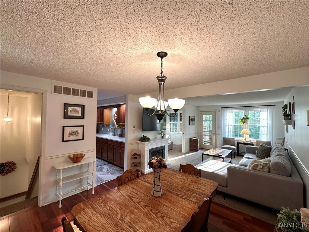 Dining room with cherry hardwood flooring