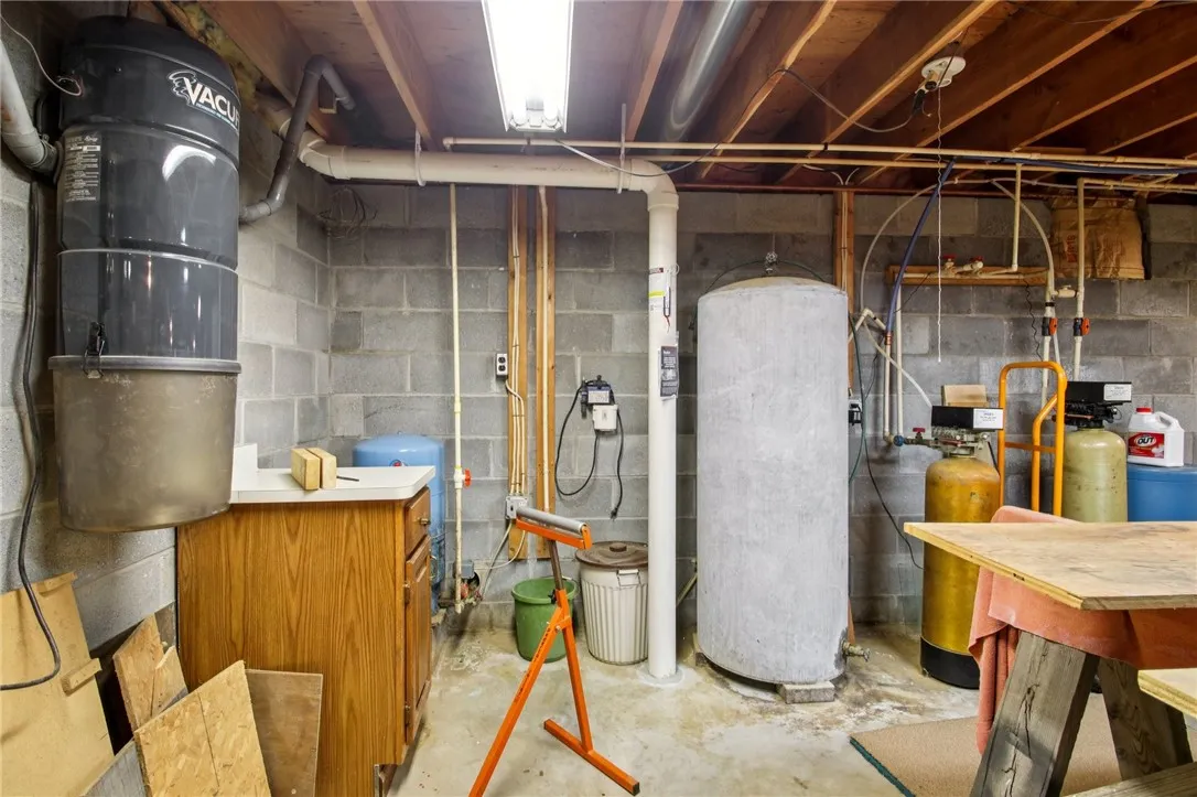 central vaume tank & water treatment system for well