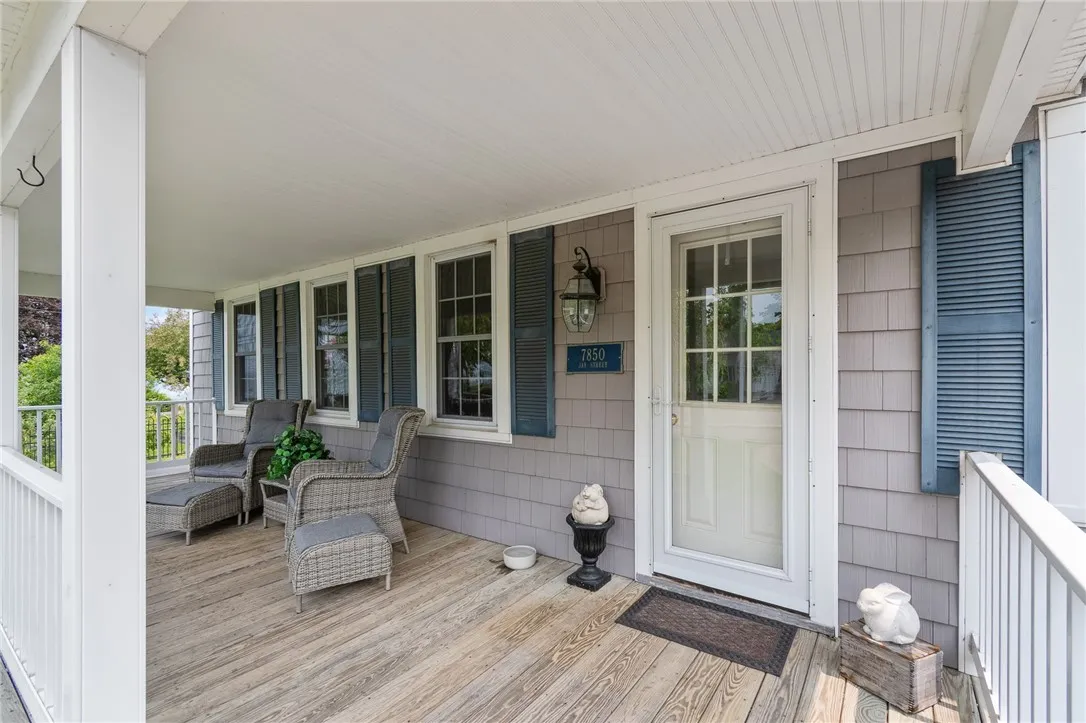 The WIDE front porch at this circa 1800s home