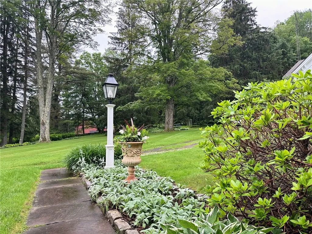 Beautiful Side Entry with Porch into the Chef's Kitchen
