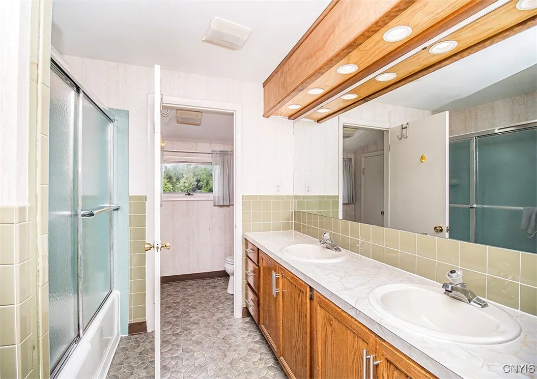 Large hallway bathroom.