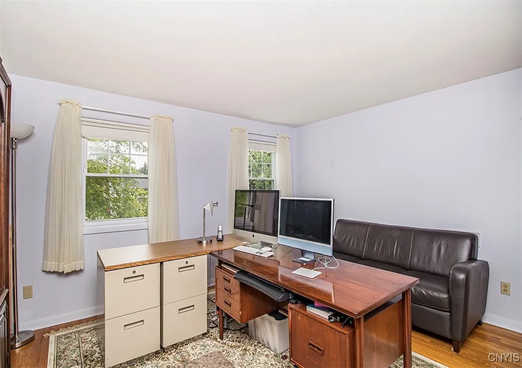 4th bedroom currently being used by an office.