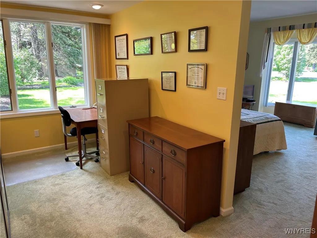 Office/dressing area in primary suite\n