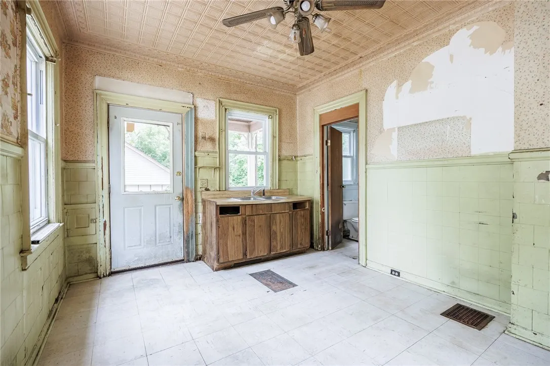 kitchen with entry to back deck & 1st floor bathroom