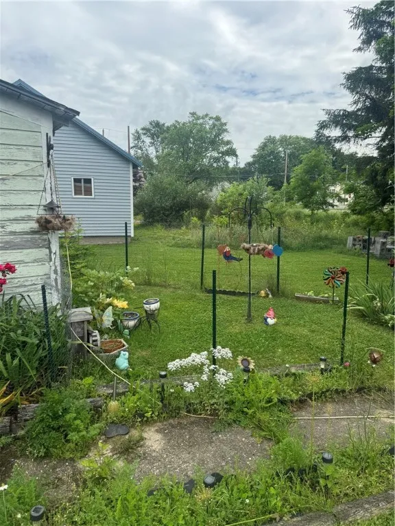 fenced yard RT side gardens