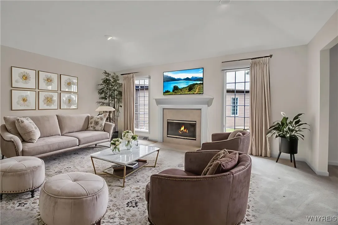 Living room is vacant & photo is staged for visual perspective only
