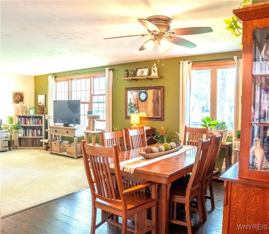 Dining room/Living room combo with newer flooring and carpeting!