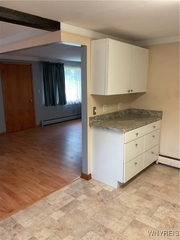 extra counter space and cabinets