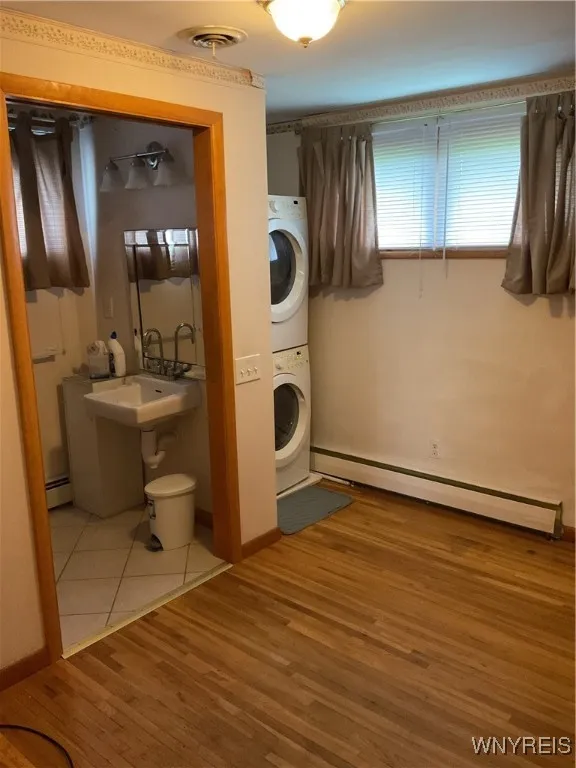 smallest bedroom with 1/2 bath and 1st floor laundry