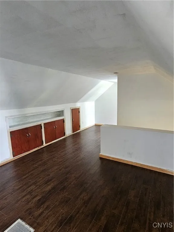 This is the other side.\r\nPrevious owners used this space for the primary bedroom, dressing room / closets.