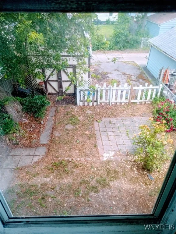 Nice yard with driveway and shed
