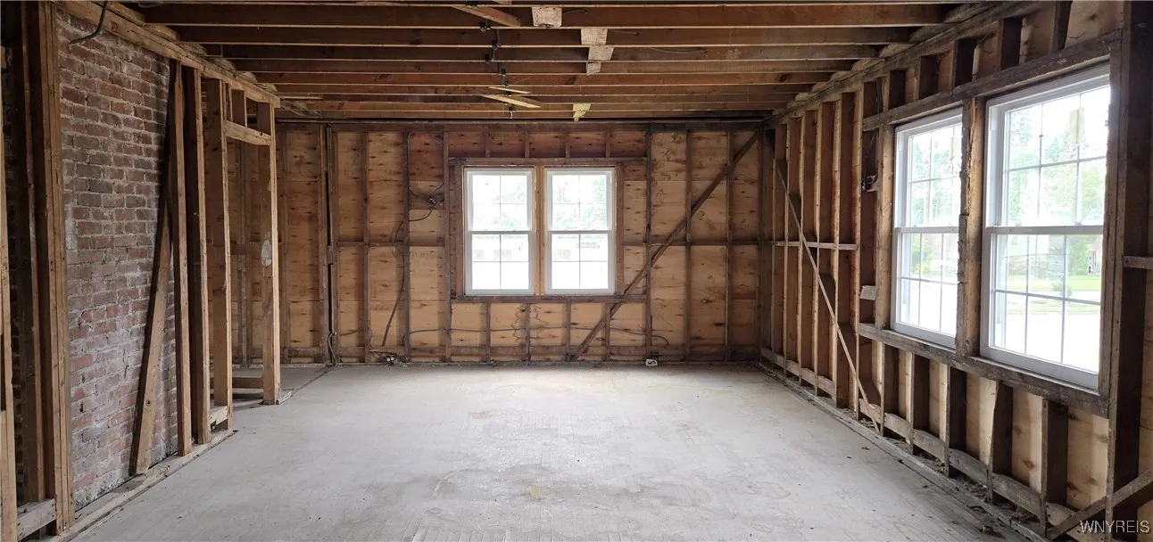 Upper Looking from Kitchen into the Living Room space