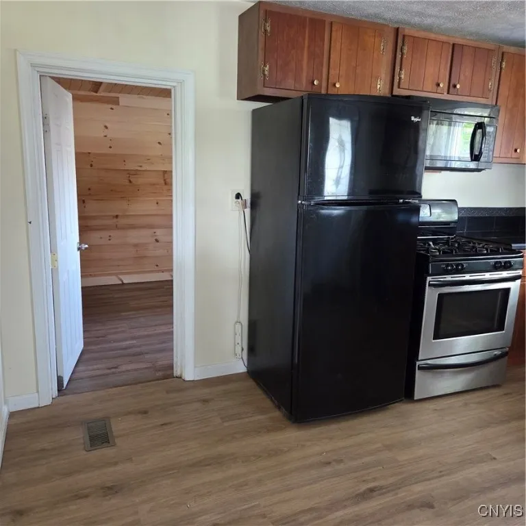 Open door is the half bath/Laundry Room