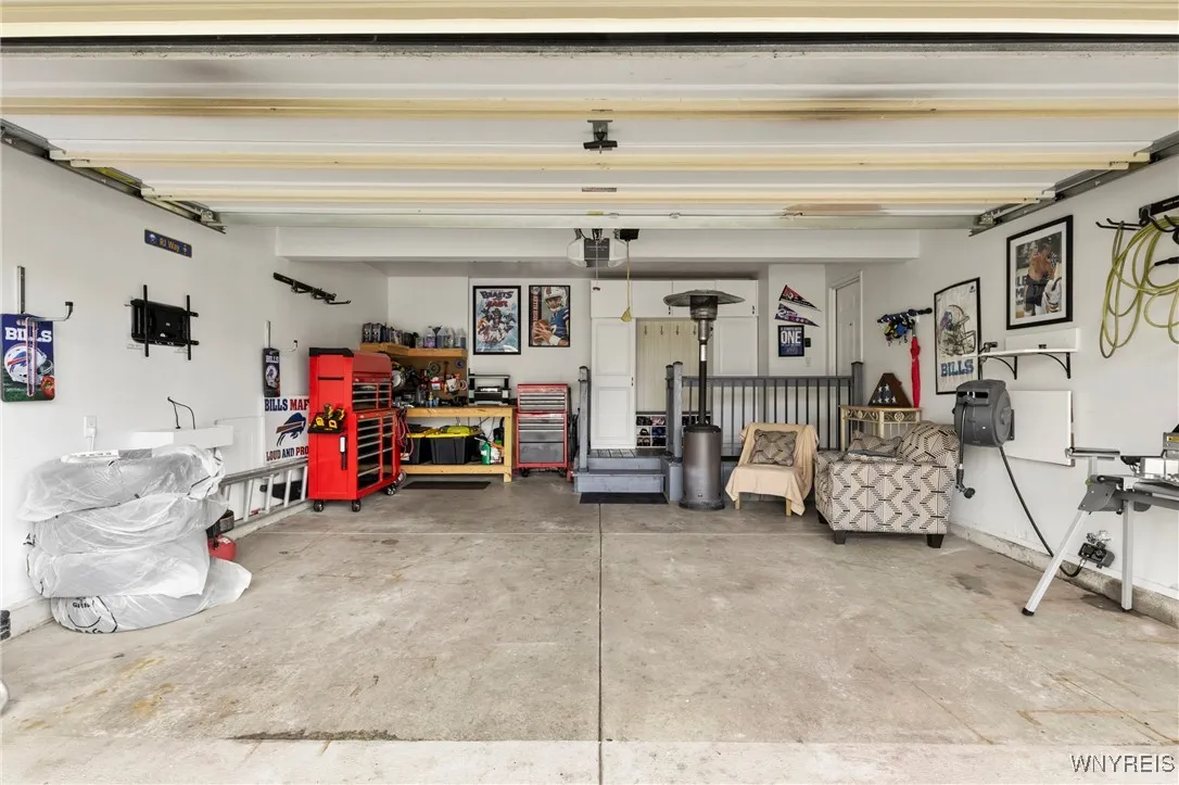 2 Car Attached Garage (Built in Cubby & Deck Can Be Removed Easily if Desired)