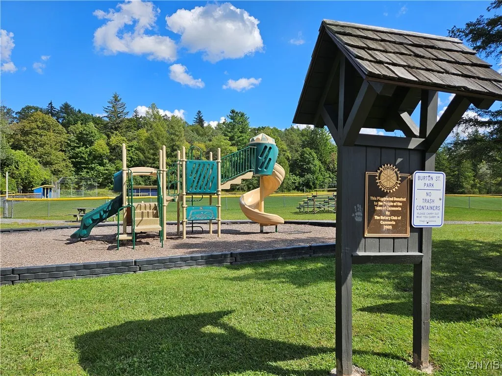 Nearby playground, baseball field and Hockey rink