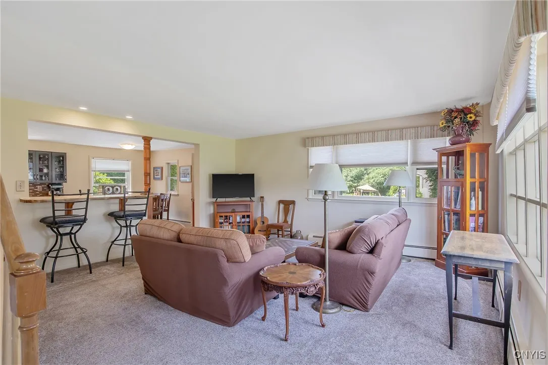 As we step into this beautiful home, you will see the open living space that has been completely reimagined and transformed.
