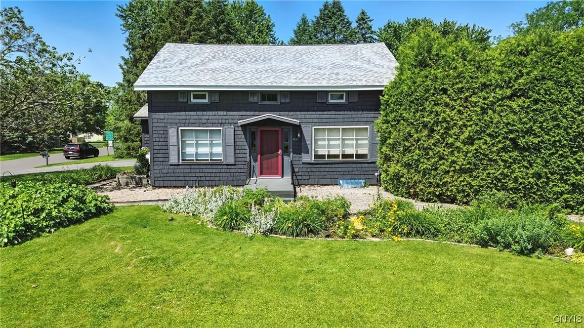 A nice shot of the front of this charming 1873 farmhouse that is now totally updated and move-in ready! This is the entrance we will use for our tour!