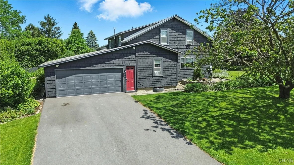 The new driveway comes in off of the quiet side street and provides great access to the house.