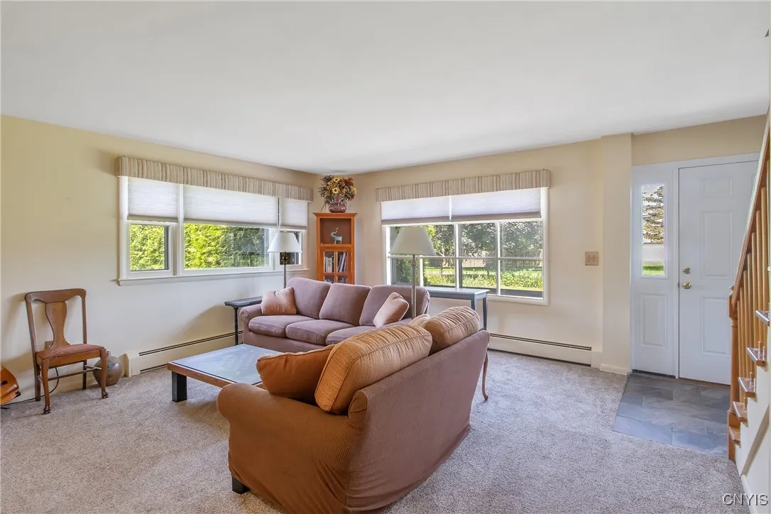The large picture windows fill the room with wonderful natural light.