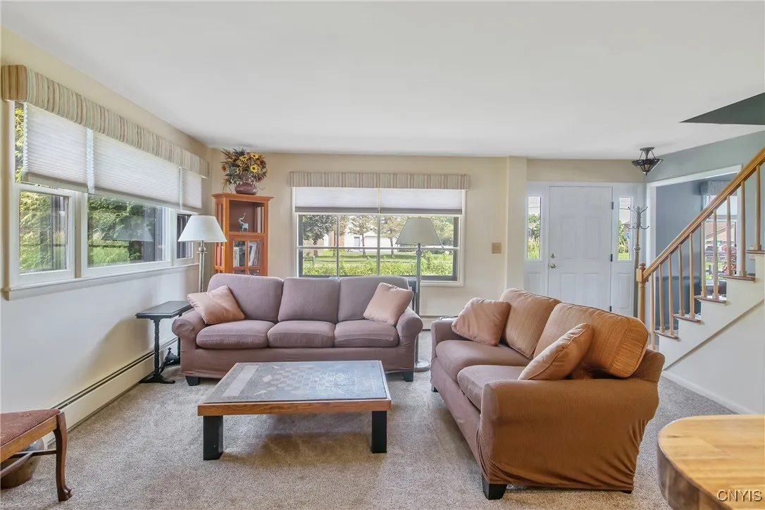The room will accommodate large furniture or a sectional, with tons of options for furniture placement.