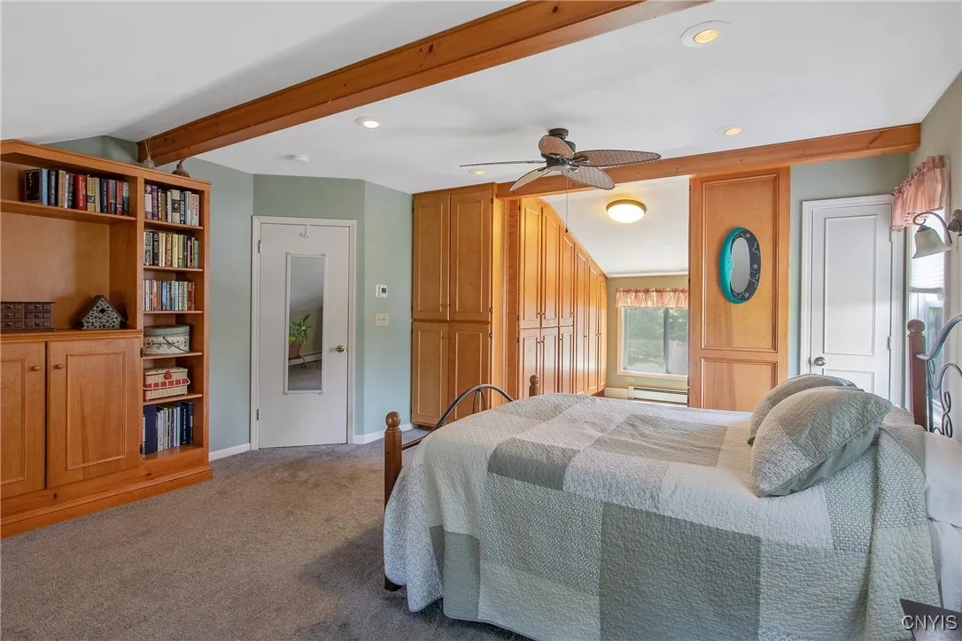 A look at the other side of the room with more custom built-ins, including bookshelves!