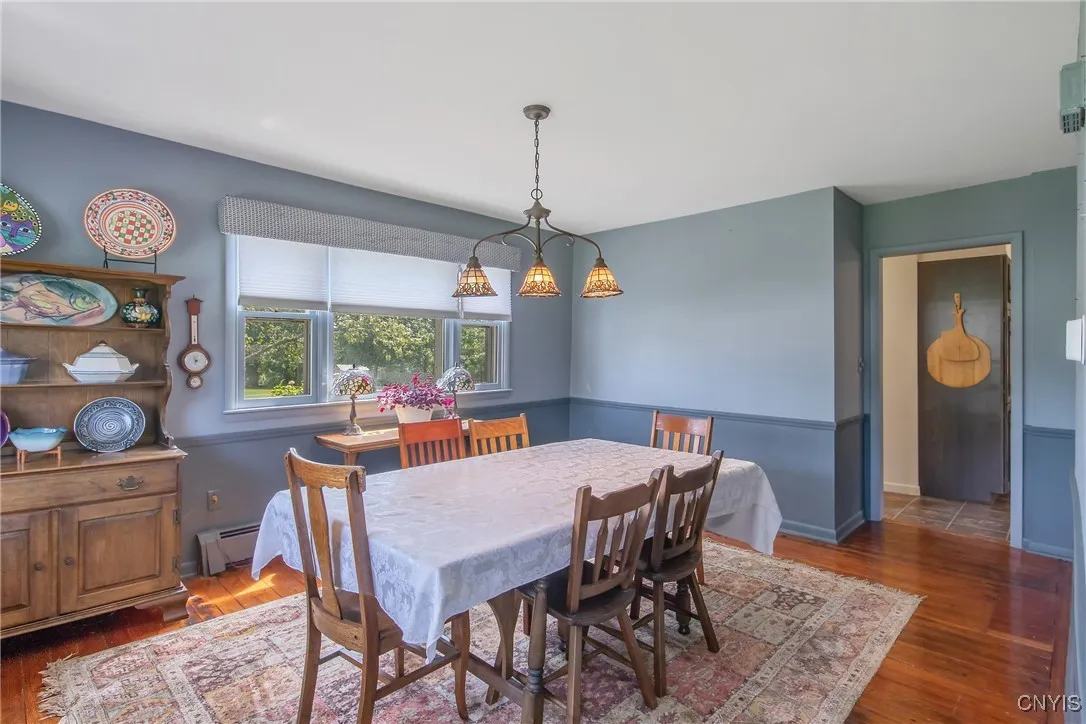 Looking back toward the doorway to the kitchen, you will see the abundant wall space in this room that will accommodate large furniture.