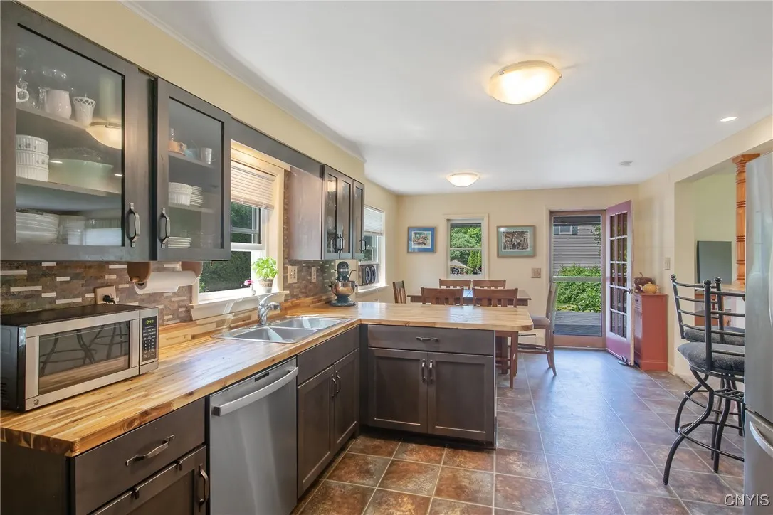 A great look at the kitchen leading out to the backyard.