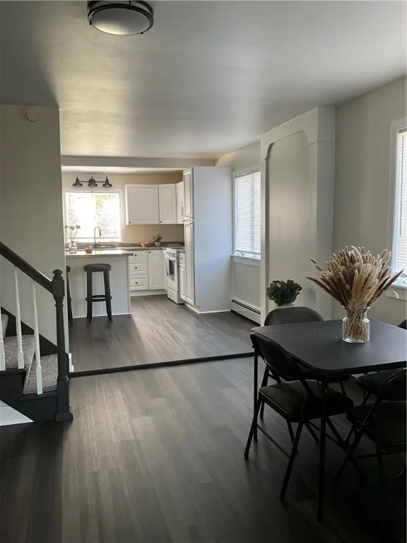 From living room through dining room to kitchen