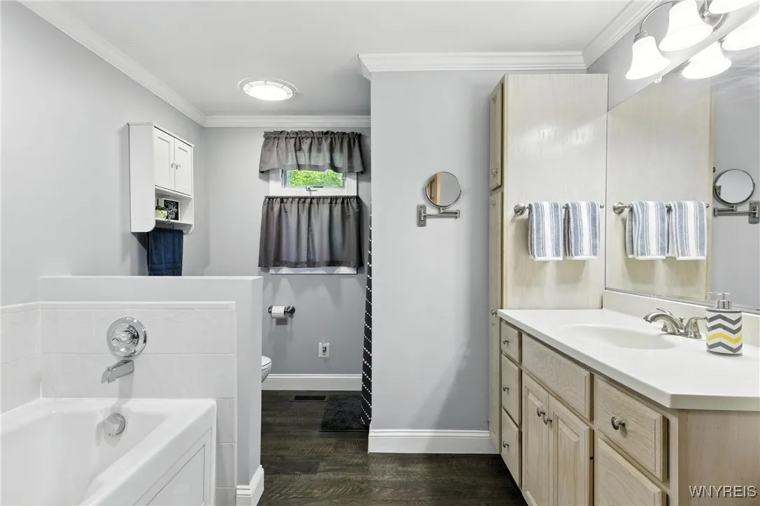 Full bath with Jacuzzi tub and separate shower.
