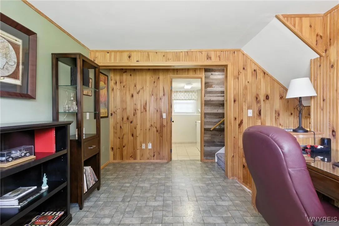 This is a great office but what about a playroom?  You can watch the children while doing laundry.