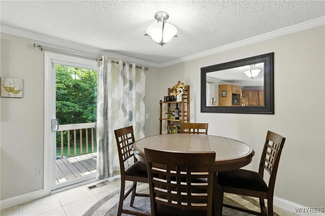 Eating area overlooks the back yard.