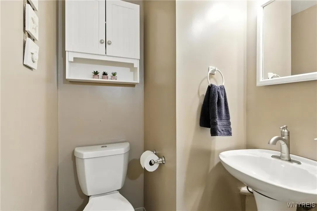 Half bath off laundry room.