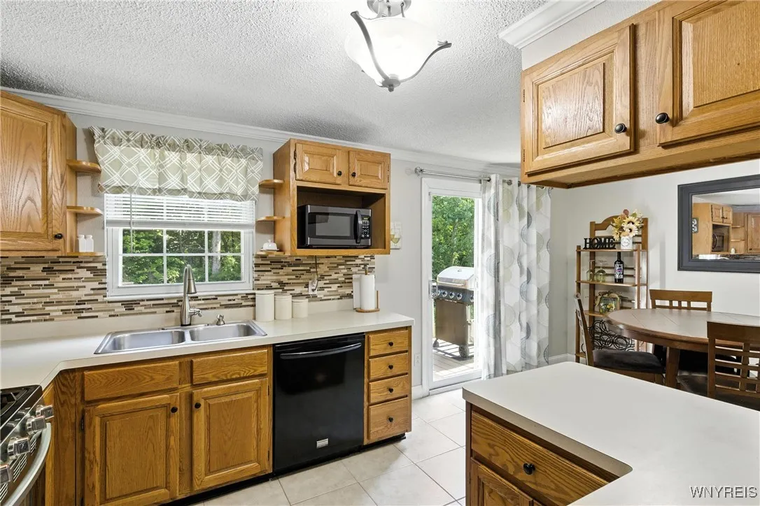Kitchen open to eating area.