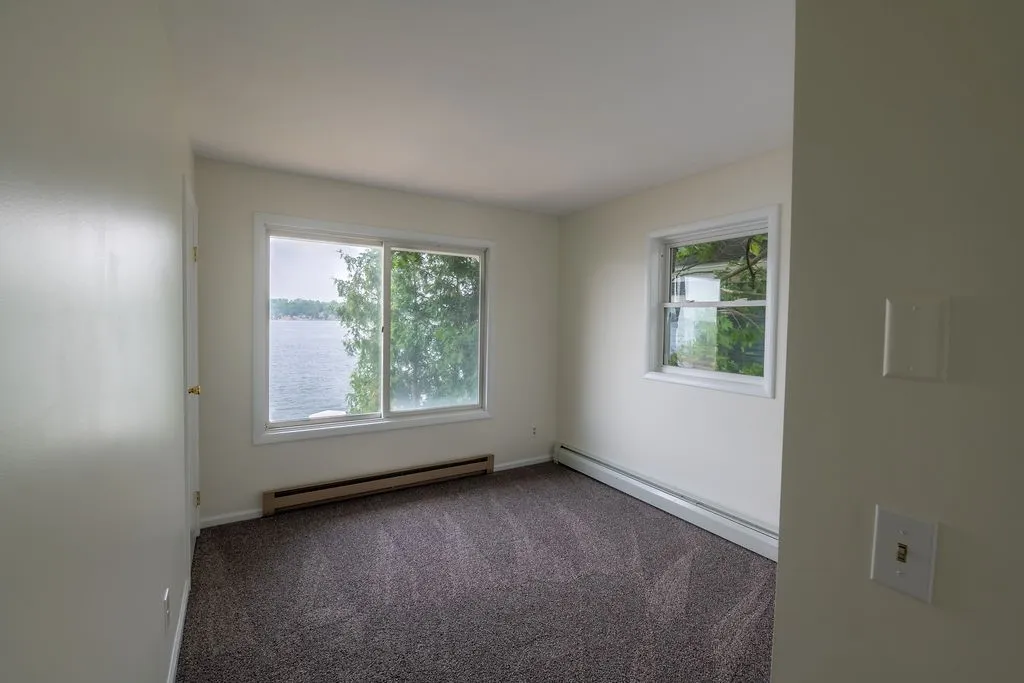 Bedroom 3 upstairs with lake views, brand new​​‌​​​​‌​​‌‌​‌‌​​​‌‌​‌​‌​‌​​​‌​​ carpet
