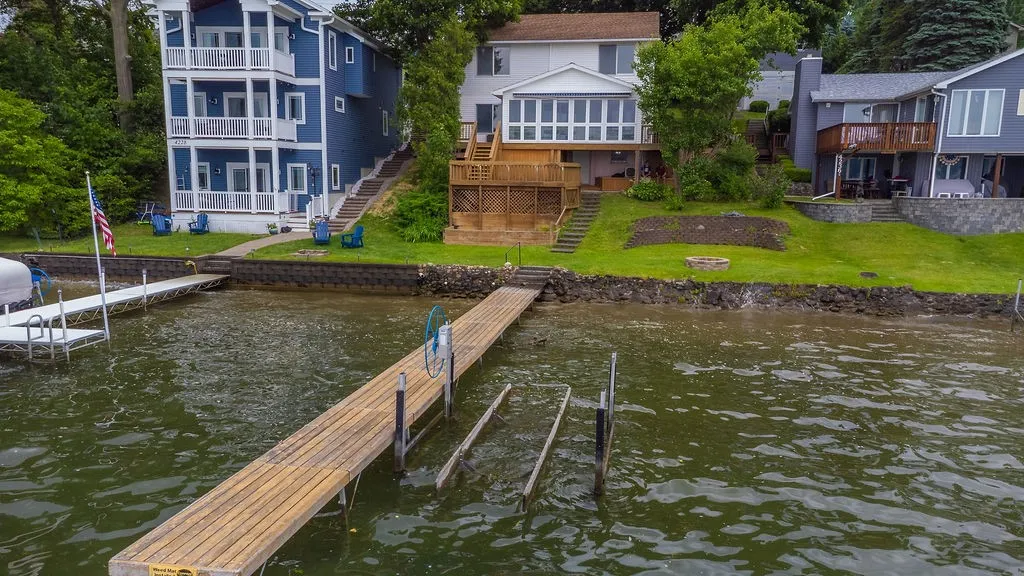 60 ft dock included, firepit, lovely water curb appeal, boat hoist negotiable