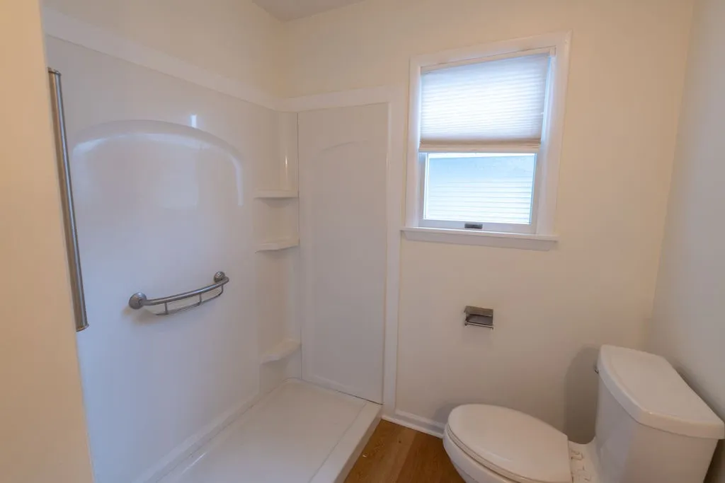 Main bathroom upstairs has a walk in shower