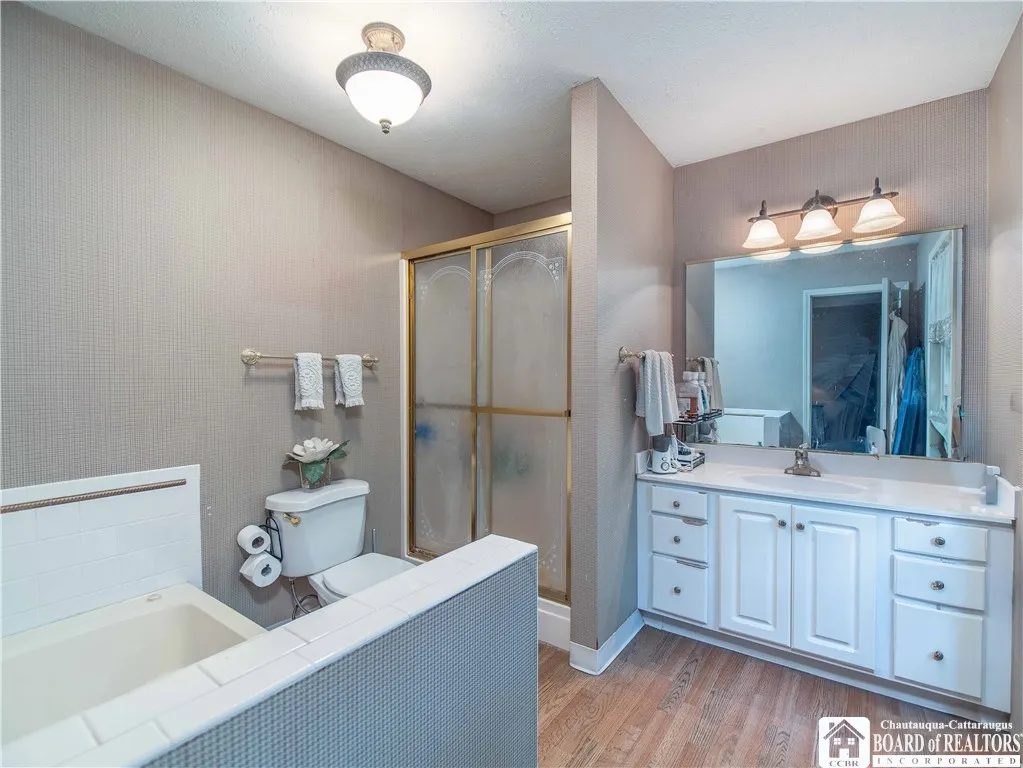 Primary Bath with Jacuzzi and walk in Shower