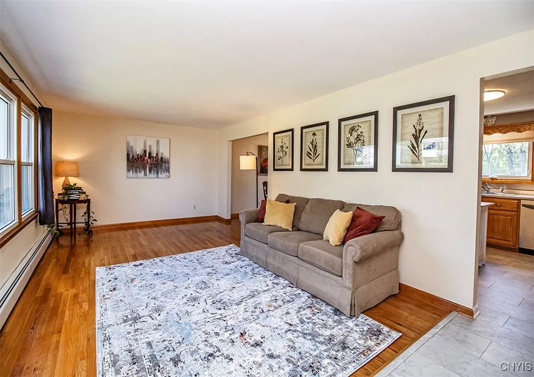 Beautiful hardwood floors throughout the home but they greet you as you enter