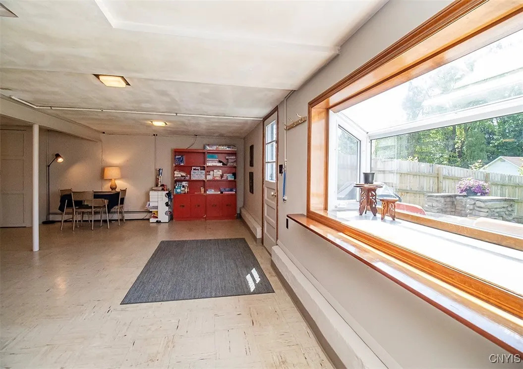 Exterior walkout basement with baywindow.   Basement has a lot of natural light with the featured bay window